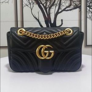 Gucci Marmont small matelassé shoulder bag.